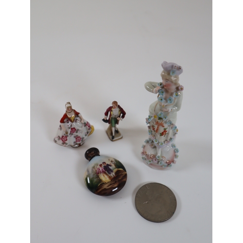 126 - Miniature 19th century Capodimonte porcelain figures, silver top bottle + Winston Churchill crown