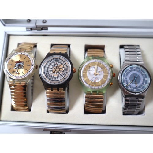 173 - 12 x Swatch Watches in Aluminium Display Case