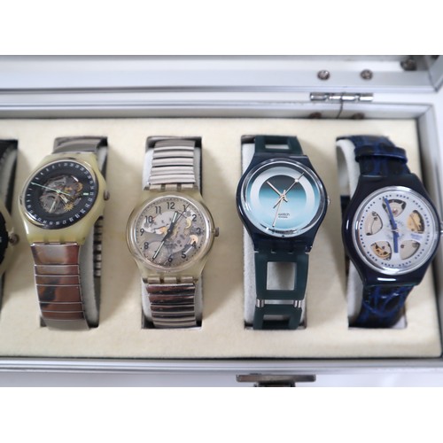 173 - 12 x Swatch Watches in Aluminium Display Case