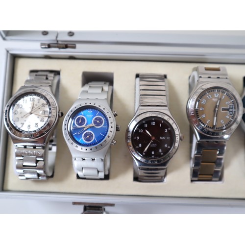 176 - 12 x Swatch Stainless / Aluminium Watches in Aluminium Display Case