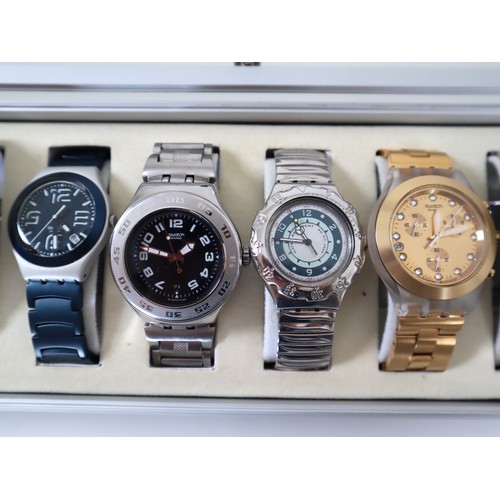 176 - 12 x Swatch Stainless / Aluminium Watches in Aluminium Display Case