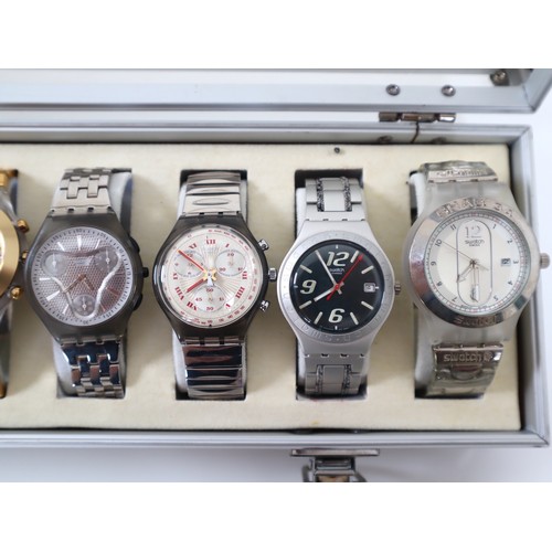 176 - 12 x Swatch Stainless / Aluminium Watches in Aluminium Display Case