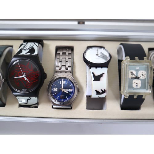 177 - 12 x Swatch Watches in Aluminium Display Case