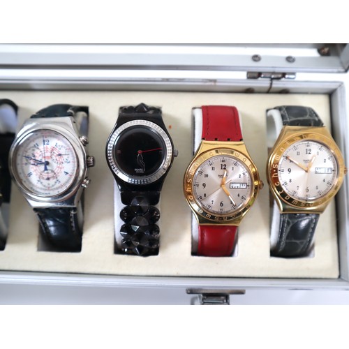 177 - 12 x Swatch Watches in Aluminium Display Case