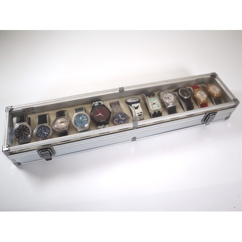 177 - 12 x Swatch Watches in Aluminium Display Case