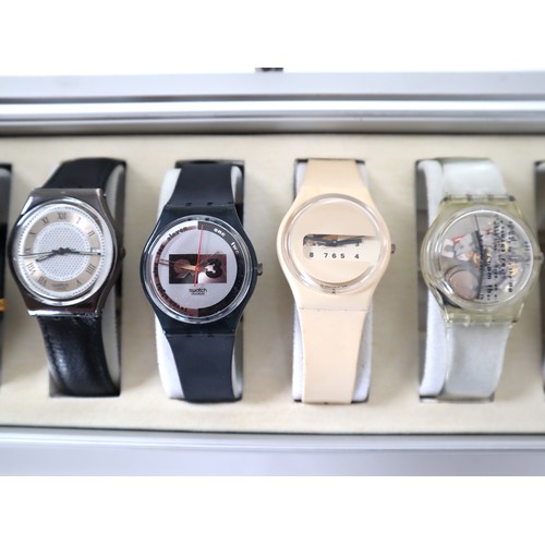 178 - 12 x Swatch Watches in Aluminium Display Case