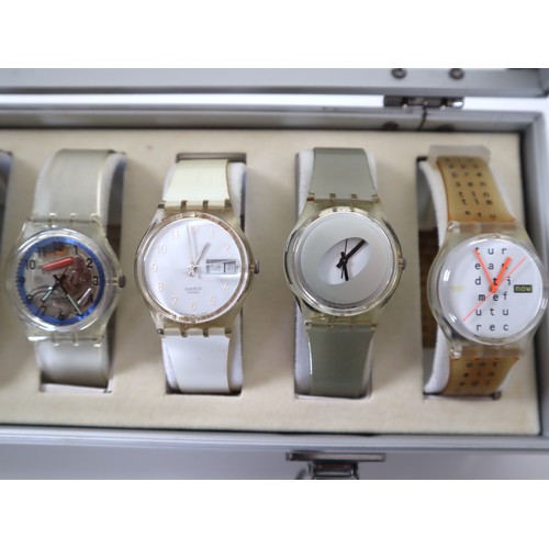 178 - 12 x Swatch Watches in Aluminium Display Case