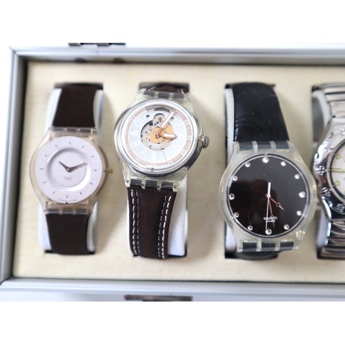 182 - 12 x Swatch Watches in Aluminium Display Case