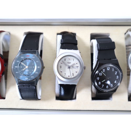 182 - 12 x Swatch Watches in Aluminium Display Case