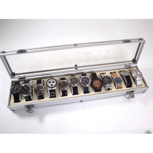 183 - 12 x Swatch Watches including Chrono in Aluminium Display Case