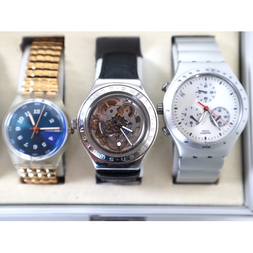 183 - 12 x Swatch Watches including Chrono in Aluminium Display Case