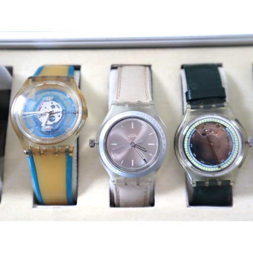 184 - 7 x Swatch Skin Watches in Aluminium Display Case