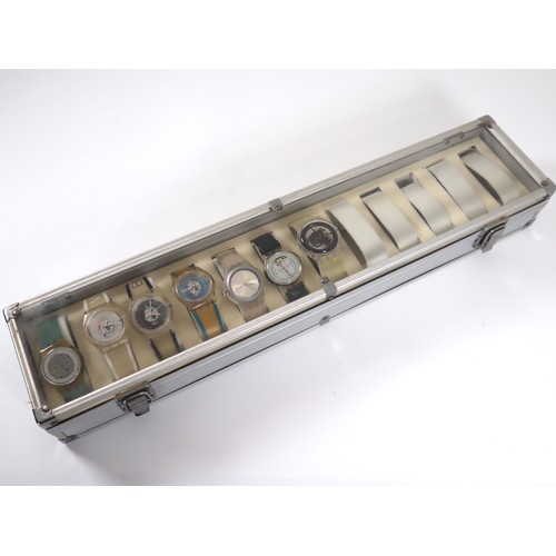 184 - 7 x Swatch Skin Watches in Aluminium Display Case