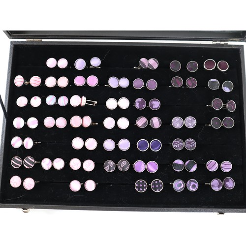 193 - Collection of Purple Cufflinks in display case