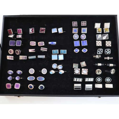 196 - Collection of Novelty cufflinks in display case