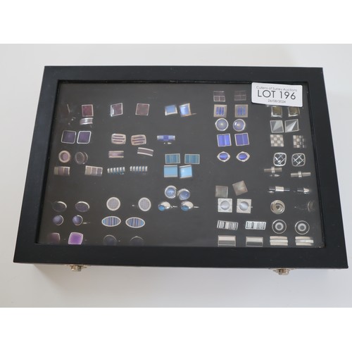 196 - Collection of Novelty cufflinks in display case