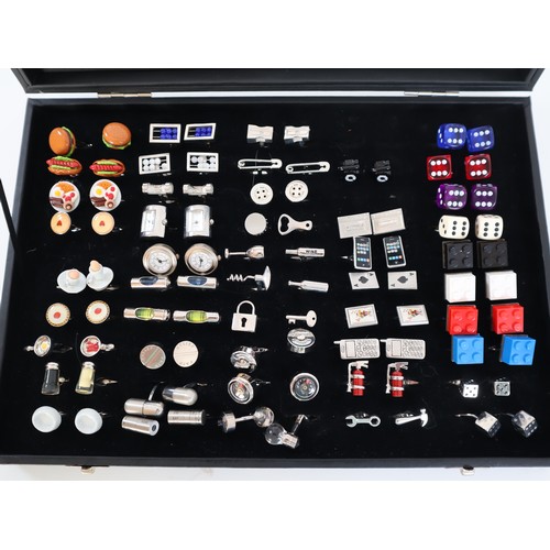 197 - Collection of novelty cufflinks in display case