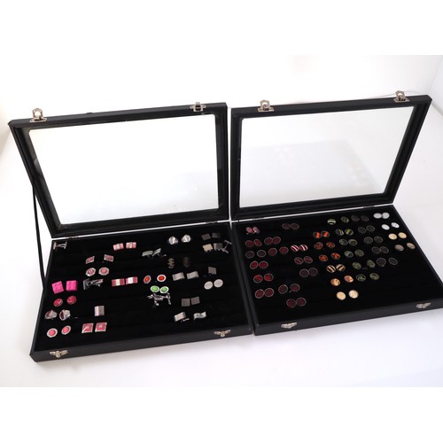 199 - Two display cases of novelty and fabric cufflinks