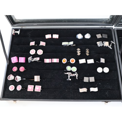 199 - Two display cases of novelty and fabric cufflinks