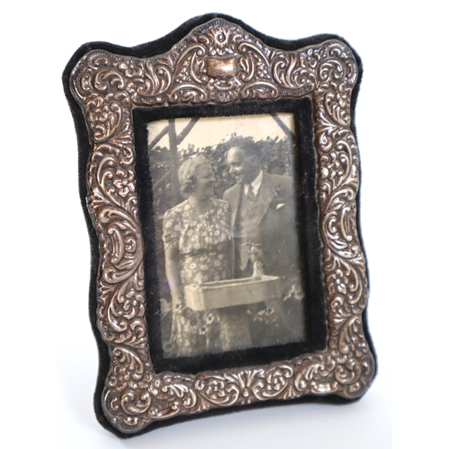 136 - Sterling Silver Repouse Photo Frame 15cm x 10cm