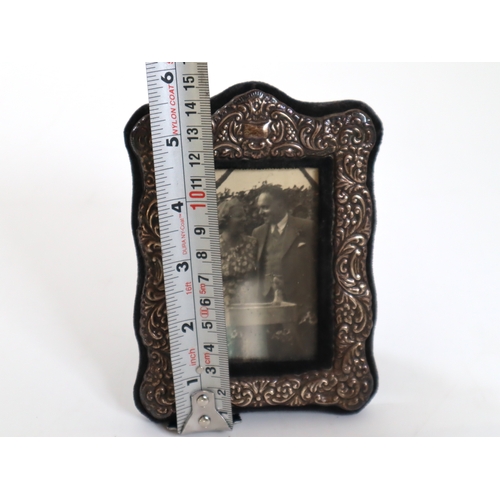 136 - Sterling Silver Repouse Photo Frame 15cm x 10cm