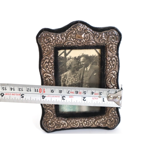 136 - Sterling Silver Repouse Photo Frame 15cm x 10cm