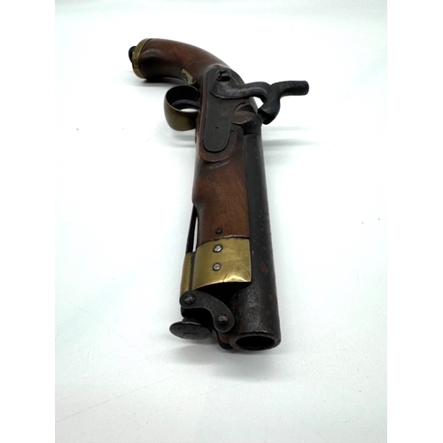 205 - 19th century single shot percussion pistol marked with the rampant lion symbol of the East India Com... 