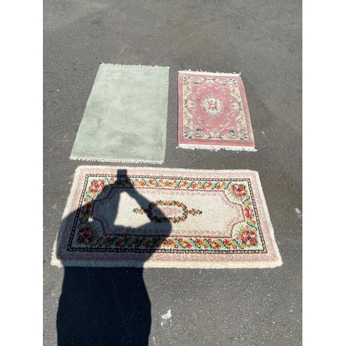 787 - Three small miscellaneous rugs