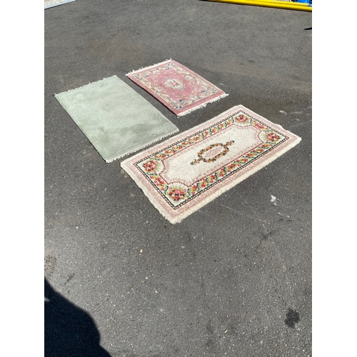 787 - Three small miscellaneous rugs