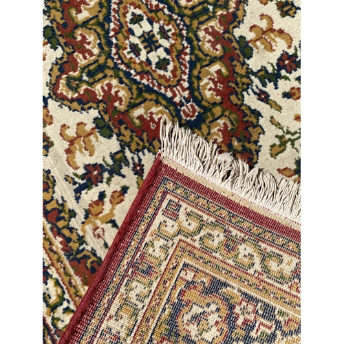 788 - Two matching rugs and a small rug