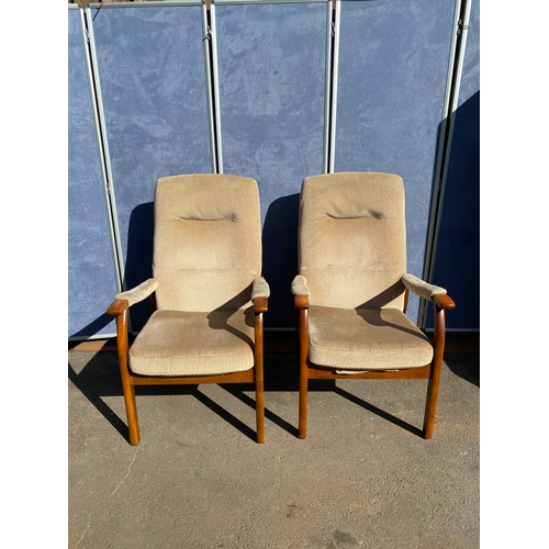 816 - A pair of upholstered Parker Knoll arm chairs