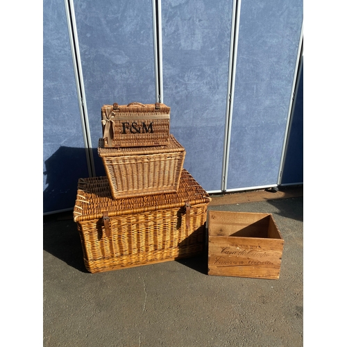 819 - A collection of wicker baskets and a wooden crate including Fortum & Mason Basket