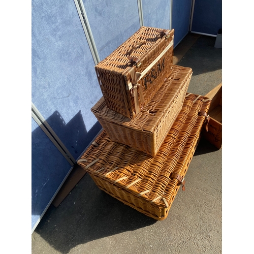 819 - A collection of wicker baskets and a wooden crate including Fortum & Mason Basket