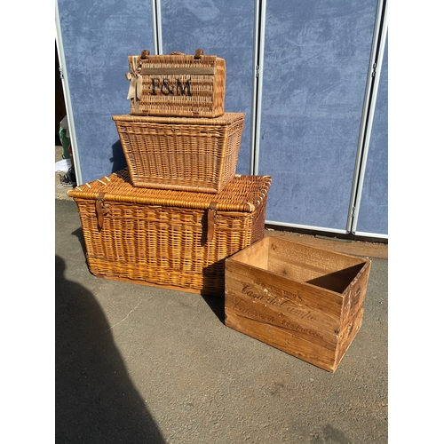 819 - A collection of wicker baskets and a wooden crate including Fortum & Mason Basket