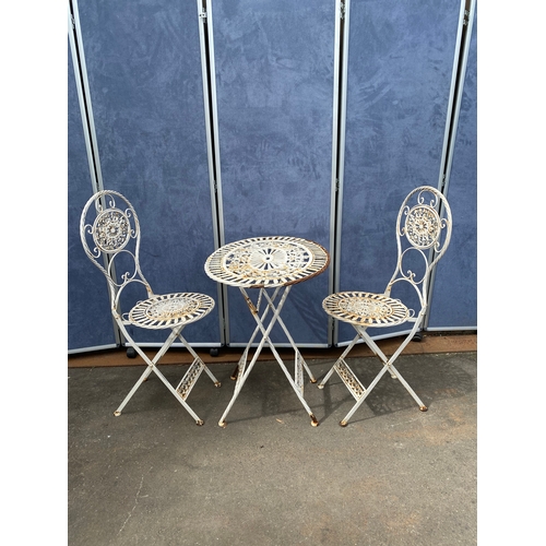 829 - Vintage Wrought Iron foldable garden table and chairs