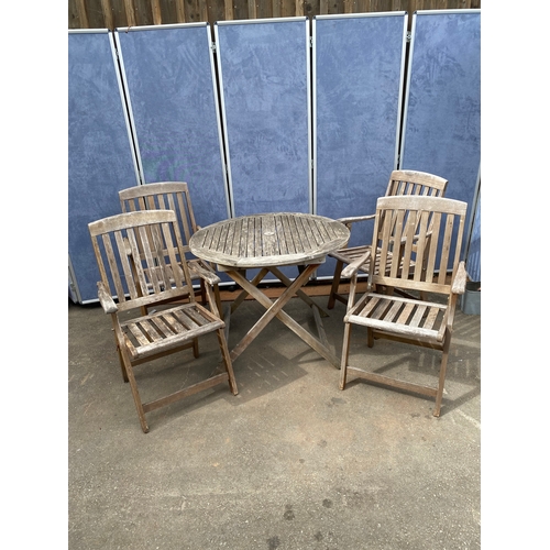 830 - Wooden foldable garden table and four chairs