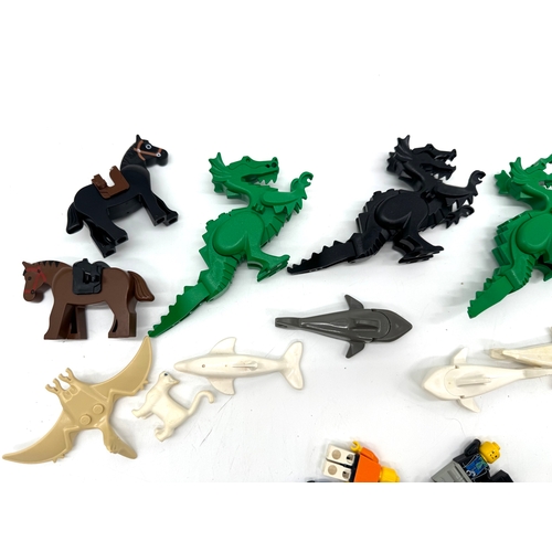 186 - Lego - Collection of various minifigures, dragons, horses, sharks etc