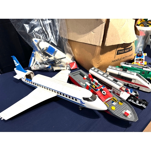 188 - Lego - Collection of loose and built set including 7893 Passenger Plane, 7897 Train, 7898 Cargo Trai... 