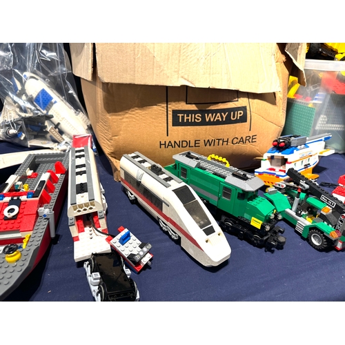 188 - Lego - Collection of loose and built set including 7893 Passenger Plane, 7897 Train, 7898 Cargo Trai... 