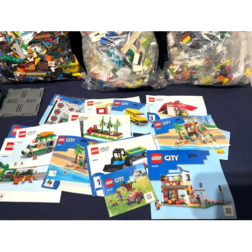 191 - Lego - Large collection of loose pieces + multiple Lego City sealed poly bags + instructions, plus p... 