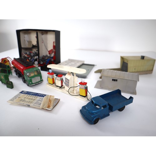 47 - Assortment of Corgi & Dinky accessories, petrol pump , garages etc