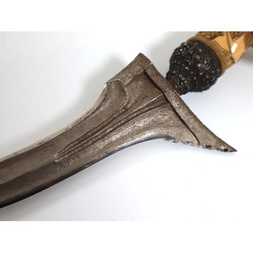 54 - Late 19th Century Indonesian Keris / Kris Meteorite  Damascus blade with bone and white metal hilt i... 