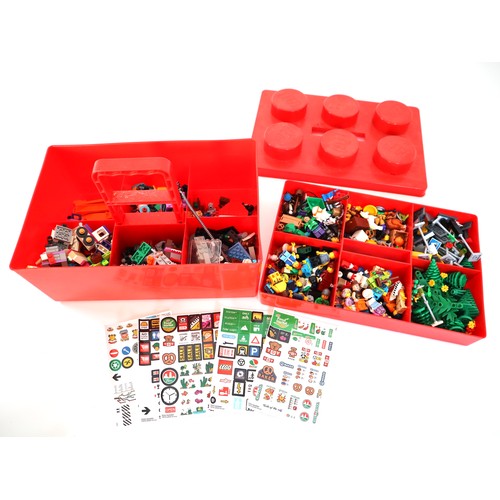 204 - Collection of various minifigures + loose lego pieces in a Lego block storage case