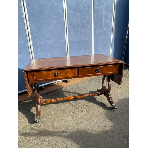 653 - Two inlaid leather top drop leaf tables.