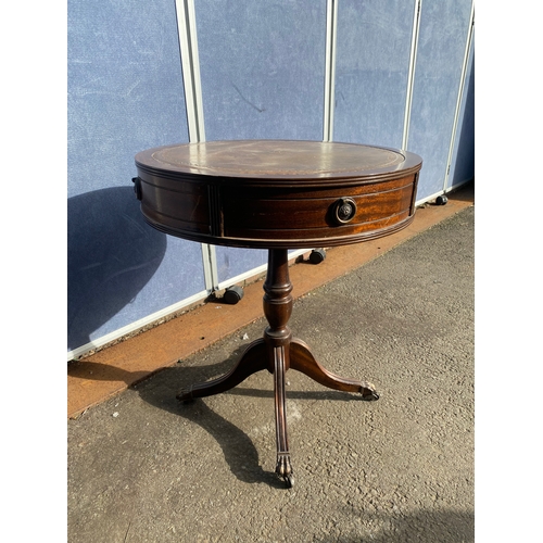 654 - Brown inlaid leather top barrel side table.