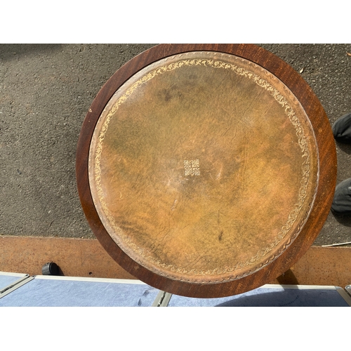 654 - Brown inlaid leather top barrel side table.