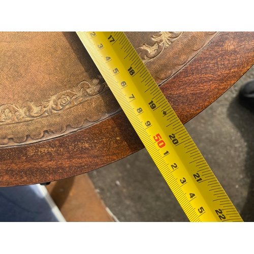 654 - Brown inlaid leather top barrel side table.