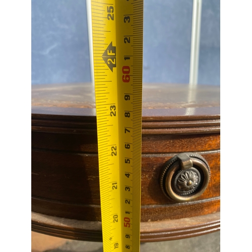 654 - Brown inlaid leather top barrel side table.