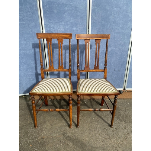 655 - A pair of Antique spindle back side chairs.