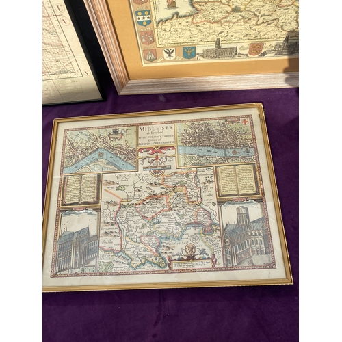 670 - Three framed maps